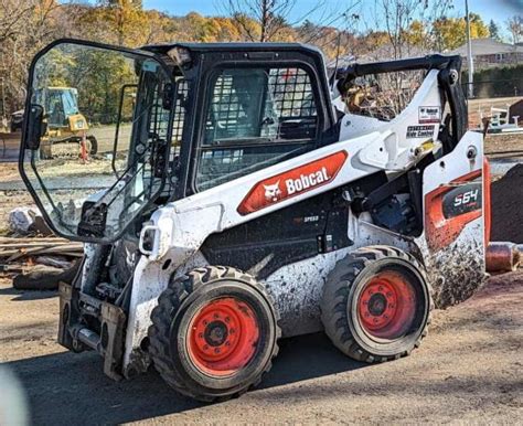 whats a lot of hours for a skid steer|what does a bobcat cost.